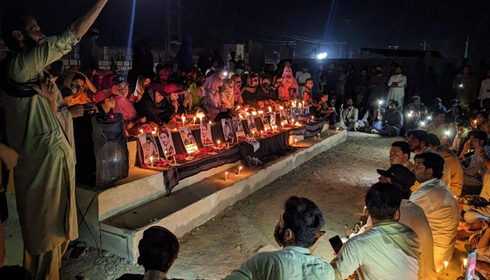 Men and women associated with the Baloch Yakjehti Committee (BYC) are lighting candles as a protest for their loved ones. — Facebook/@BalochYakjehtiCommitee/file