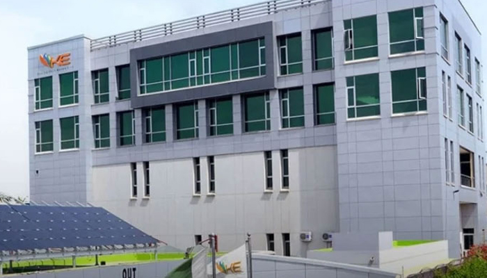 A view of the K-Electric head office, with solar panels at the parking area, in Karachi. — K-Electric website/File