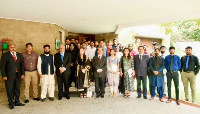 Director Global and Regional Studies Centre Institute of Business Management Karachi Ambassador (retd) Ghulam Rasool Baluch (centre) Executive Director CISSS Ambassador (retd) Qazi M. Khalilullah, (left to 4th) , Director General Press Information Department Regional Directorate Karachi Irum Tanveer (centre to 2nd) and other officials are seen in this image. — Facebook/@sksbhand/file