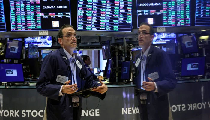 Traders work on the floor of the New York Stock Exchange (NYSE) in New York City, US June 14, 2022. — Reuters