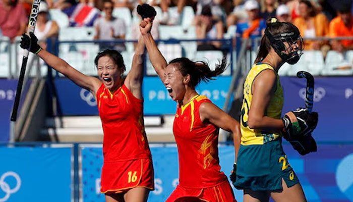 Zixia Ou of China and Ning Ma of China celebrate their first goal. — Reuters/file