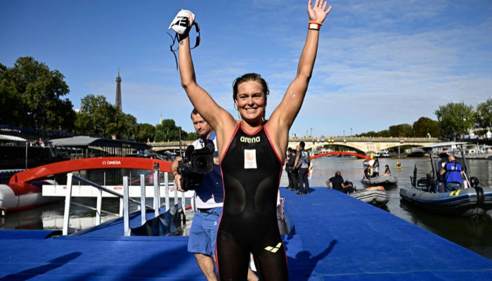 Dutchwoman Sharon van Rouwendaal celebrates her Olympic gold in the womens 10km marathon swimming final.— AFP/file