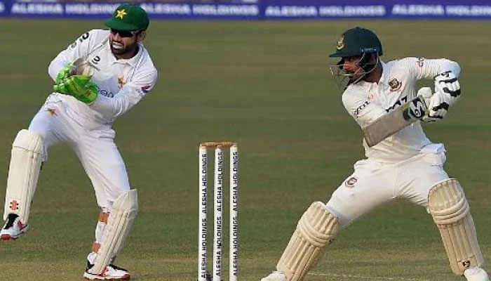 Pakistans wicket-keeper Mohammad Rizwan reacts as a Bangladeshi batsman plays a shot during a Test match. — AFP/File