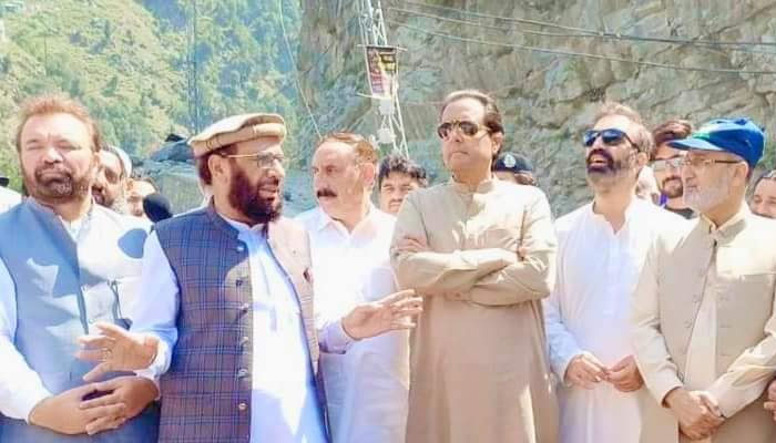 Captain (retd) Mohammad Safdar (centre) pictured alongside PML-N MNA Sardar Mohammad Yusuf during the reopening ceremony of a bridge connecting KP with Gilgit-Baltistan in this image released on August 12, 2024. — Facebook/Capt (R) Muhammad Safdar Awan [Official]