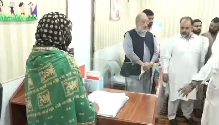 Khyber Pakhtunkhwa Health Minister Syed Qasim Ali Shah meeting with Chief Nursing Superintendent Zeenat Bibi and she is getting retired from Maulvi Ameer Shah Memorial Hospital seen in this image on August 14, 2024. — Screen grab via Facebook/@SQasimAliShah
