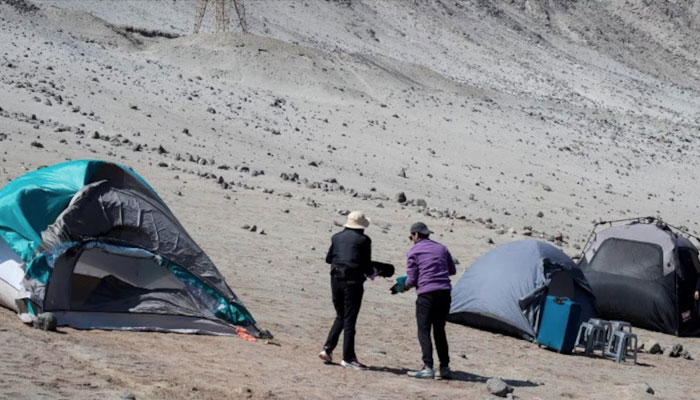 Workers on strike from BHPs Escondida copper mine, camp outside Coloso port owned by the copper company, in Antofagasta, Chile August 14, 2024. — Reuters