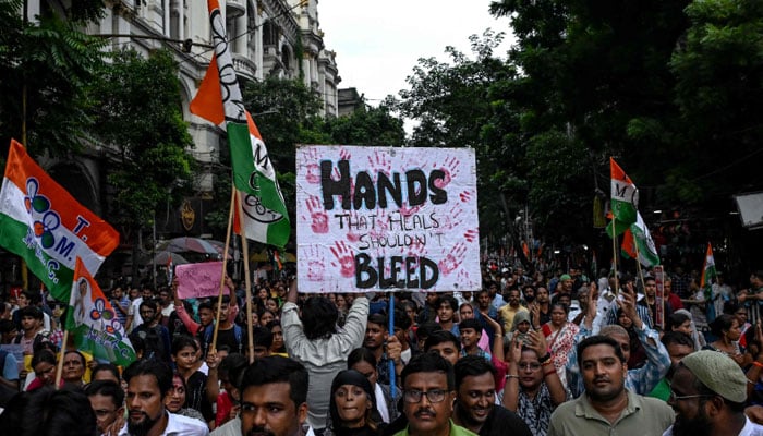 Activists and supporters of Trinamool Congress (TMC) party take part in a protest march to condemn the rape and murder of a doctor in Indias West Bengal state, in Kolkata on August 16, 2024. — AFP