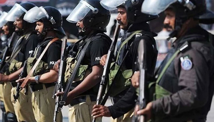 A representational image showing police personnel standing alert at an undisclosed location. — APP/file