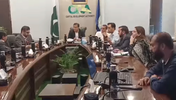 CDA Chairman Muhammad Ali Randhawa talks with other CDA officials on August 19, 2024. — Screengrab Facebook/@cda.isb.pk/file