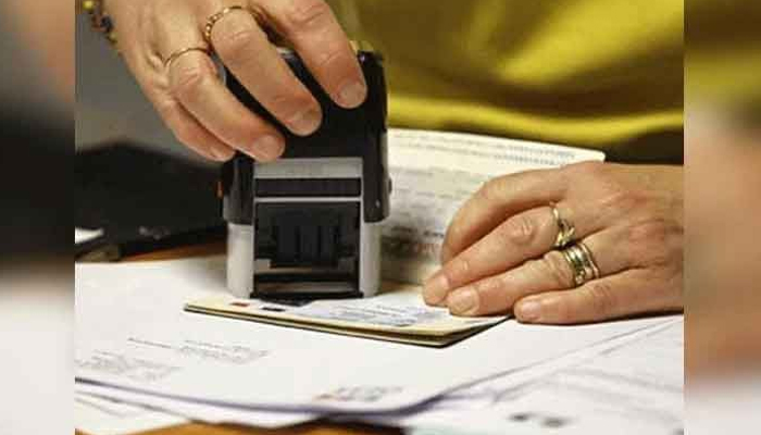 A representational image of a person attesting domicile certificate. — Reuters/File