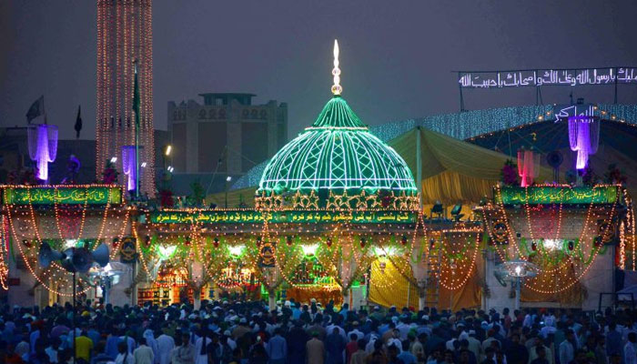 In this undated photo, devotees visit the shrine of Hazrat Data Ganj Bakhsh on the eve of his Urs in Lahore. — APP