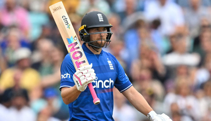 England’s Dawid Malan celebrates his half-century during the third One Day International (ODI) cricket match between England and New Zealand at The Oval in London on September 13, 2023. — AFP