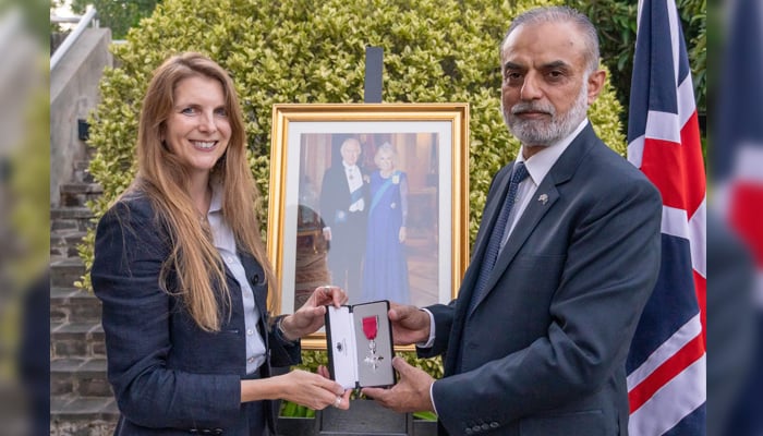 British High Commissioner Jane Marriott awards honourary MBE to Captain Shakeel ur Rehman over services for UK-Pakistan relations August 28, 2024. — Facebook/@syedzaigham.hussain.9