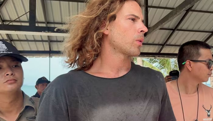 Daniel Sancho Bronchalo, the son of Spanish actor Rodolfo Sancho Aguirre, being escorted on Aug 7, 2023. — Reuters