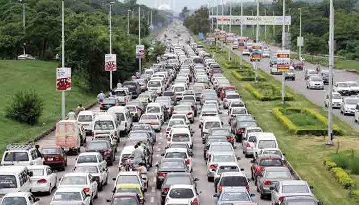 There are long queues of vehicles on 6 tracks of Zero Point Rawat section of Islamabad Highway seen in this image. — Online
