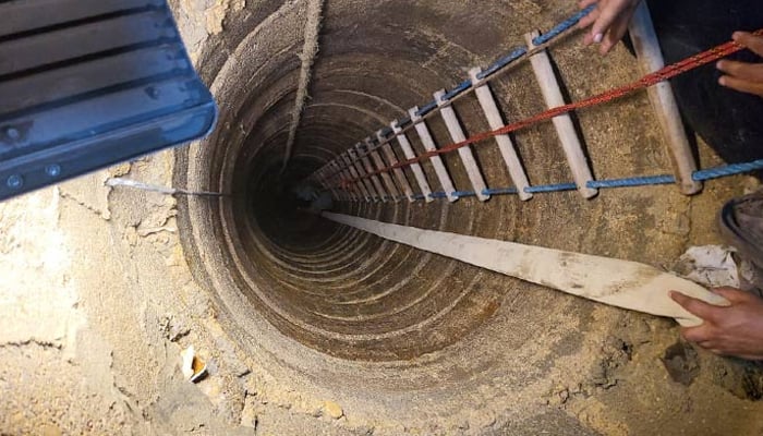 The submersible pump well located inside the compound of a residential building in Karachis Garden East. — Reporter