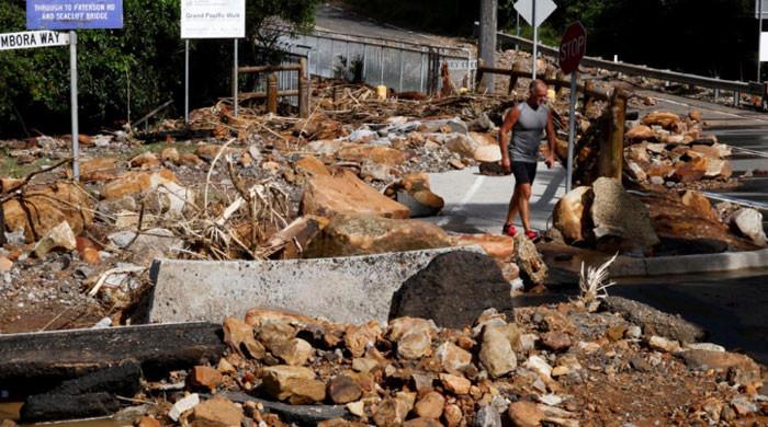 Thousands of Australians without power as heavy rain, damaging winds ...