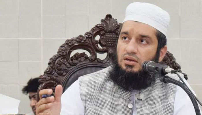 Mayor Peshawar Zubair Ali gestures while speaking at a meeting. — APP/File