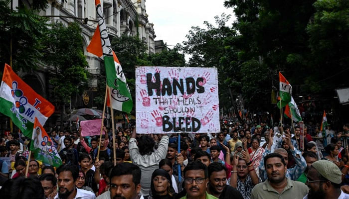 Activists and supporters of Trinamool Congress (TMC) party take part in a protest march to condemn the rape and murder of a doctor in Indias West Bengal state, in Kolkata on August 16, 2024. — AFP