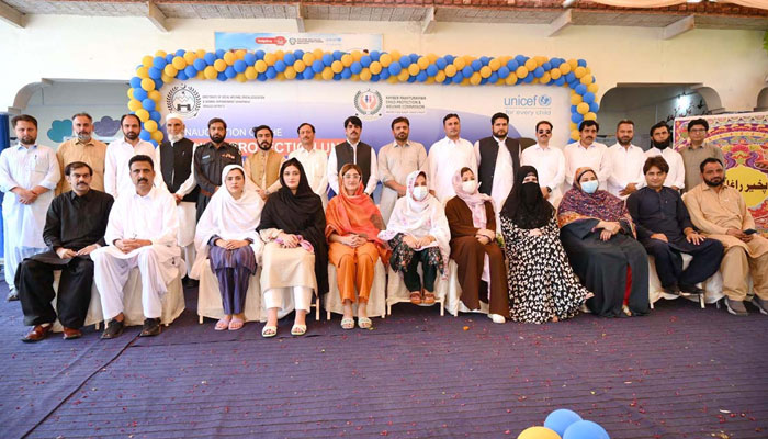 Additional Secretary Social Welfare Department KP Muhammad Farooq and Director Social Welfare Merged Districts Muhammad Naeem in a group photo with other officials during the inauguration ceremony of Child Protection Unit District Khyber on September 10, 2024. — APP