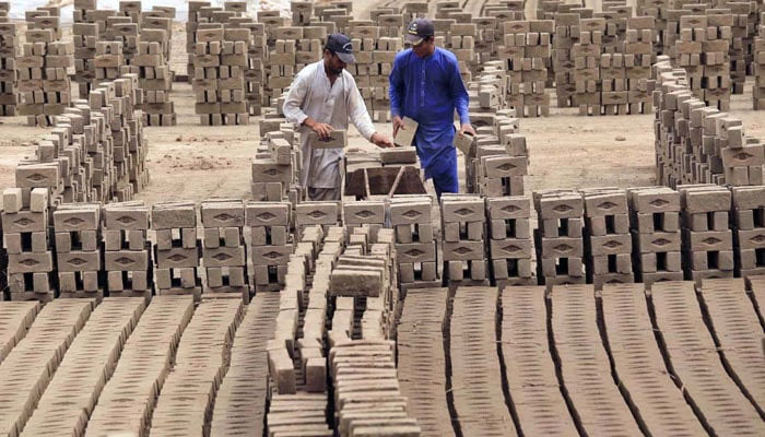 Labourers are busy in their work at brick kilns, as International Labour Day is celebrated on May 1 every year on May 1, 2024. — APP