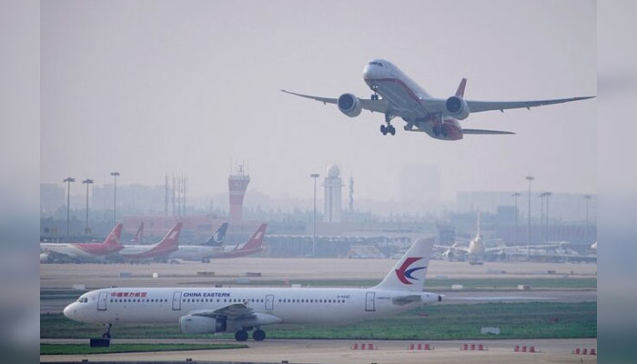 A China Eastern Airlines aircraft and Shanghai Airlines aircraft are seen in Hongqiao International Airport in Shanghai, China June 4, 2020. — Reuters