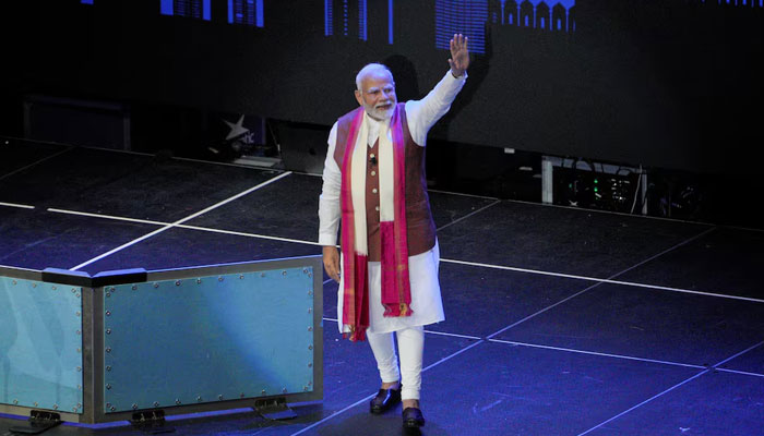 Indias Prime Minister Narendra Modi waves as he attends a gathering of the Indo-American Community of USA (IACU) in New York City, US on September 22, 2024. — Reuters