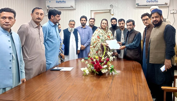 Officials from The Gandhara Hindko Academy and Directorate of Archives and Libraries, the government of KP pose for a picture after signing an MoU in this image released on October 18, 2023. — Facebook/Gandhara Hindko Board