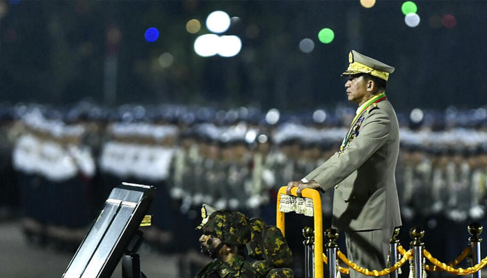 Myanmars junta chief military Min Aung Hlaing arrives to deliver a speech during a ceremony to mark the countrys Armed Forces Day in Naypyidaw on March 27, 2024. — AFP