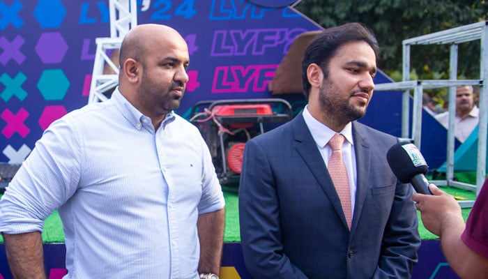 Provincial Education Minister Rana Sikandar Hayat (left) and Punjab Minister for Youth Affairs and Sports Malik Faisal Ayub Khokhar address a press conference at Adabi Baithak, Alhamra Mall Road on October 7, 2024. — Facebook/Lahore Youth Festival