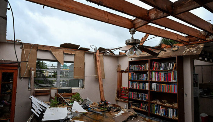 A house is seen after it was hit by a tornado in Fort Myers, Florida on October 9, 2024, as Hurricane Milton approaches. — AFP