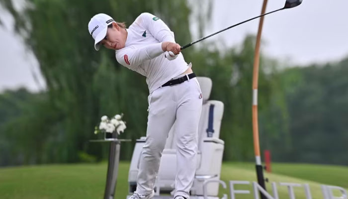 Japan’s Mao Saigo hits a tee shot during the third round of the Shanghai LPGA golf tournament. — AFP/File