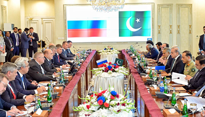 Prime Minister Shehbaz Sharif and his Russian counterpart Mikhail Mishustin seen along with delegation in Islamabad on Oct 16, 2024. — PID
