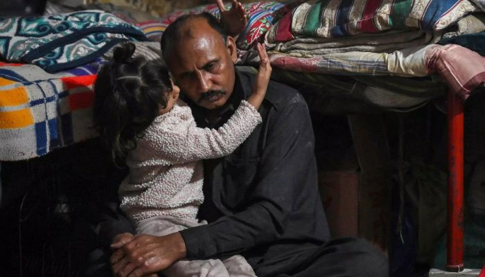 A representational image of a man and a child.— AFP/file