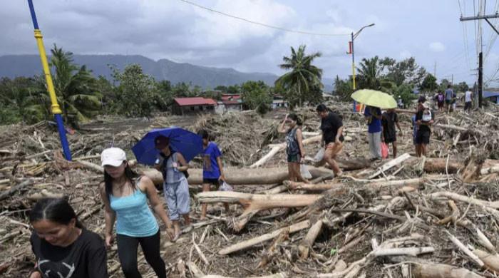 Tropical storm leaves towns submerged, 76 dead in Philippines