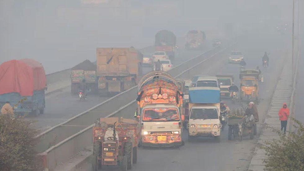 Vehicles move amid dense smog in Lahore, Pakistan.— Reuters/File