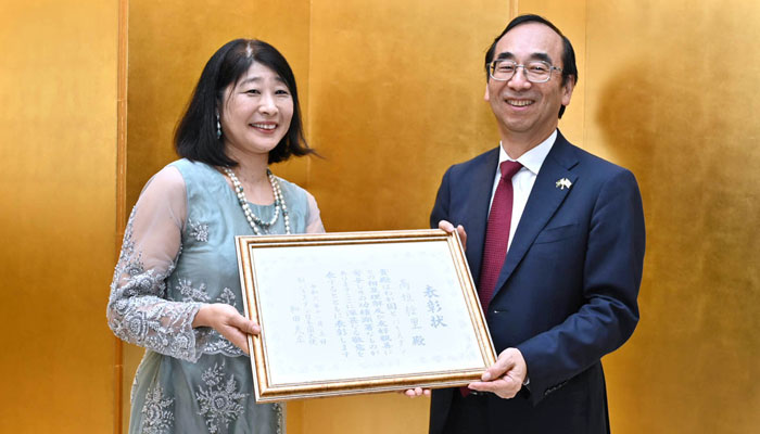 Ambassador of Japan to Pakistan, Wada Mitsuhiro (right) confers the “Japanese Ambassador’s Commendations to Takagaki Elli at a ceremony at his official residence on November 5, 2024. — APP