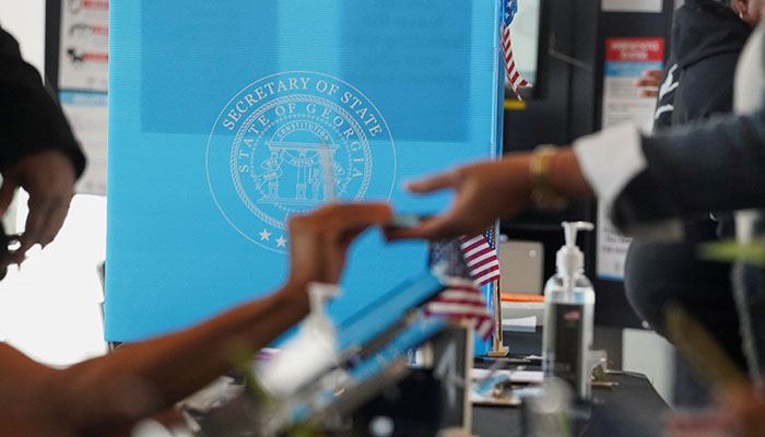 People vote at a polling station in Atlanta, Georgia, US on October 16, 2024.— Reuters