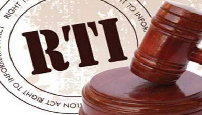 The representational image shows gavel with background of the logo of the Right to Information. — APP/File