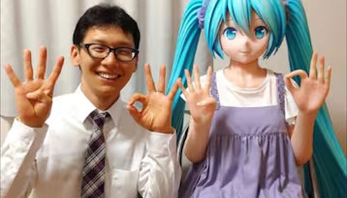 Akihiko Kondo seen with his virtual wife. — Instagram/@akihikokondosk
