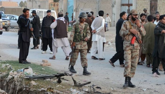 Personnel of paramilitary forces standing guard in an area of Balochistan. —AFP/ File