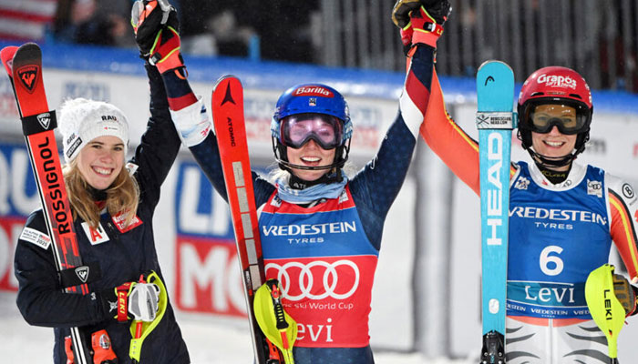 Mikaela Shiffrin (centre) celebrating after winning. — AFP/File