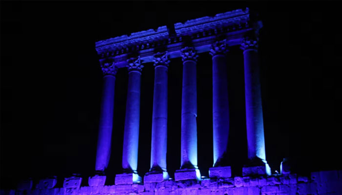 Part of the temples of Baalbek, a UNESCO world heritage site in Lebanons eastern Bekaa Valley, illuminated in blue light, Oct. 24, 2015. — AFP