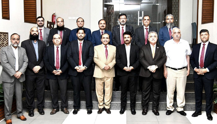 Officials of Nutech and ABAD posing for a photo after signing MoU. — Facebook@abadpakistan/file