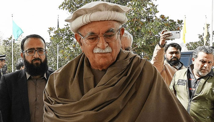 Veteran politician Mehmood Khan Achakzai arrives at the Parliament House in Islamabad on March 3, 2024. — AFP