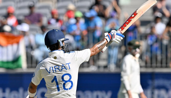 Indian batter Virat Kohli celebrates after scoring a fifty against Australia on November 24, 2024. — AFP