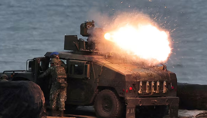 A US-made TOW-2A wire-guided anti-tank missile launched by Taiwanese soldiers from a M1167 TOW carrier vehicle at the Fangshan training grounds in Pingtung, Taiwan, on August 26, 2024.— Reuters