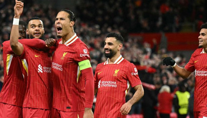 Liverpools Dutch striker Cody Gakpo (2nd from left) celebrates scoring the teams second goal during the UEFA Champions League football match against Real Madrid at Anfield in Liverpool, north west England. — AFP/File