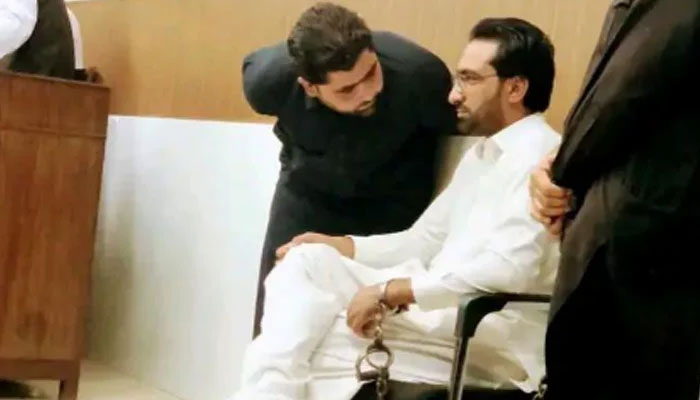 Khan Wali Afridi who was the principal of Iqra School and College of Bara is seen handcuffed in police custody. — Screengrab/ TikTok@khanwaliafridi10/File