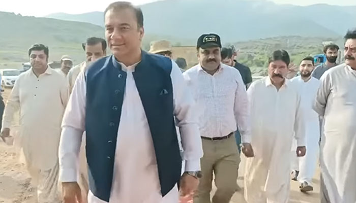 Chairman CDA Muhammad Ali Randhawa (in front) seen in this undated image.— Facebook@cda.isb.pk/File